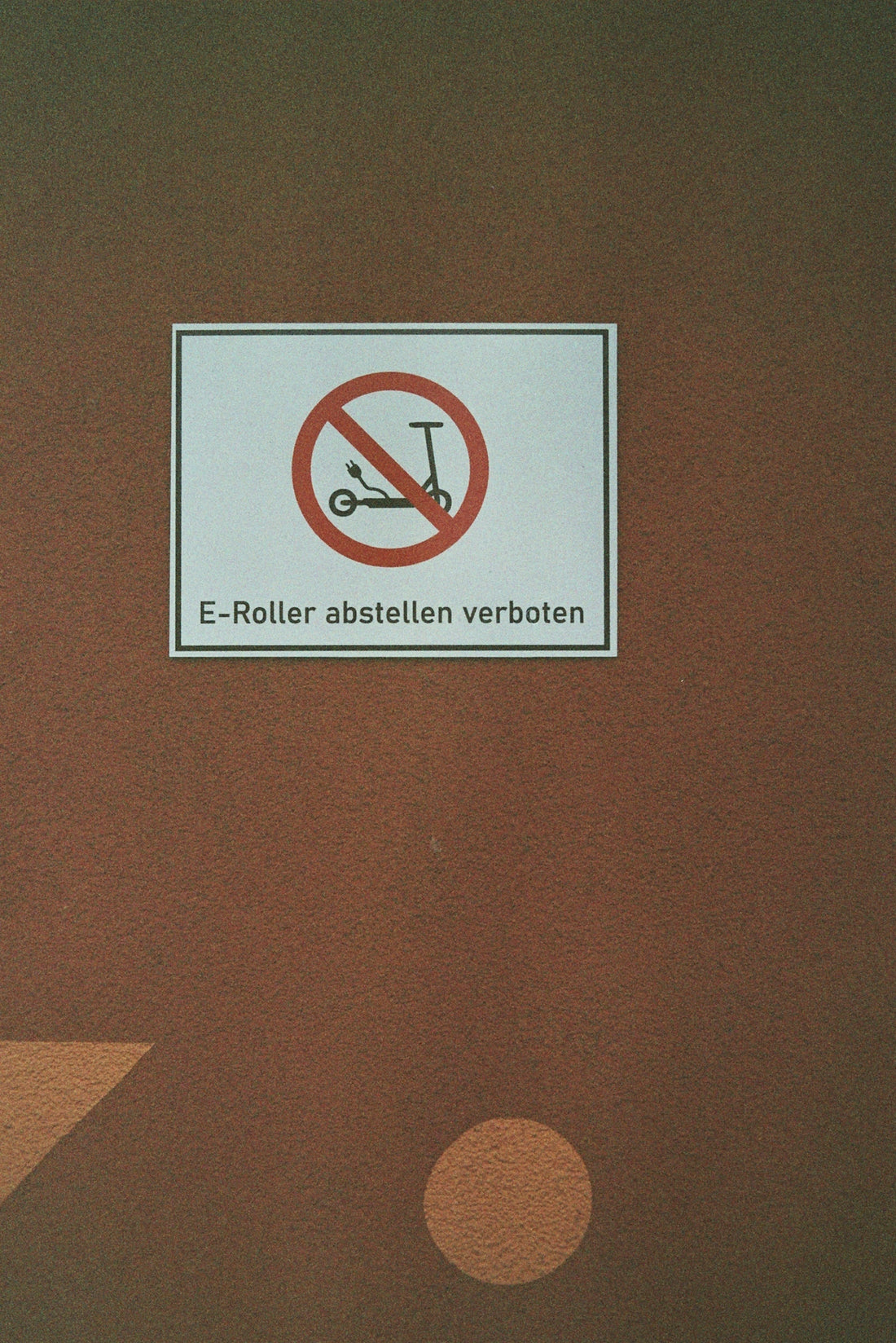 no smoking sign on brown wall
