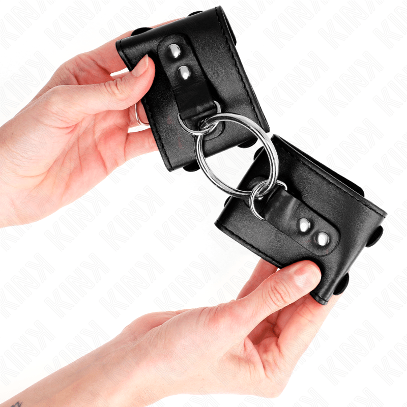KINK - FIXED WRIST RESTRAINTS WITH RING AND STUDS ADJUSTABLE BLACK 17 - 22 CM X 6.5 CM - Kink&Play