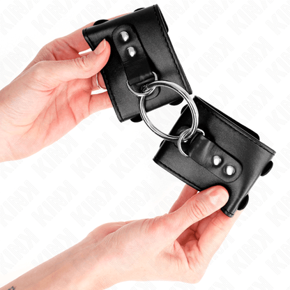 KINK - FIXED WRIST RESTRAINTS WITH RING AND STUDS ADJUSTABLE BLACK 17 - 22 CM X 6.5 CM - Kink&Play
