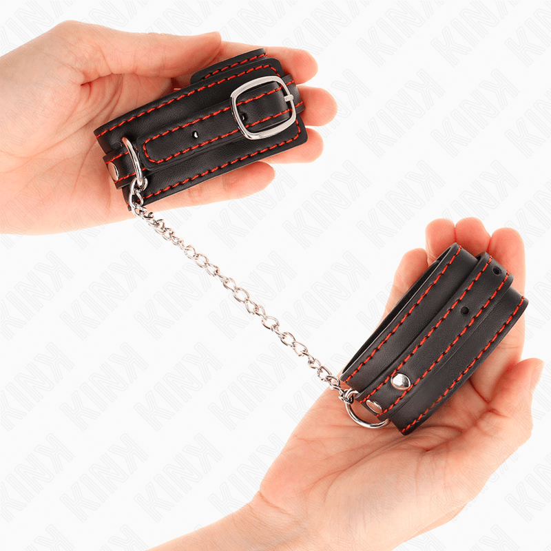 KINK - SMALL WRIST RESTRAINTS BLACK WITH RED LINING ADJUSTABLE 14 - 24 CM X 3.5 CM - Kink&Play