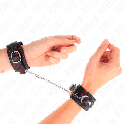 KINK - SMALL WRIST RESTRAINTS BLACK WITH RED LINING ADJUSTABLE 14 - 24 CM X 3.5 CM - Kink&Play