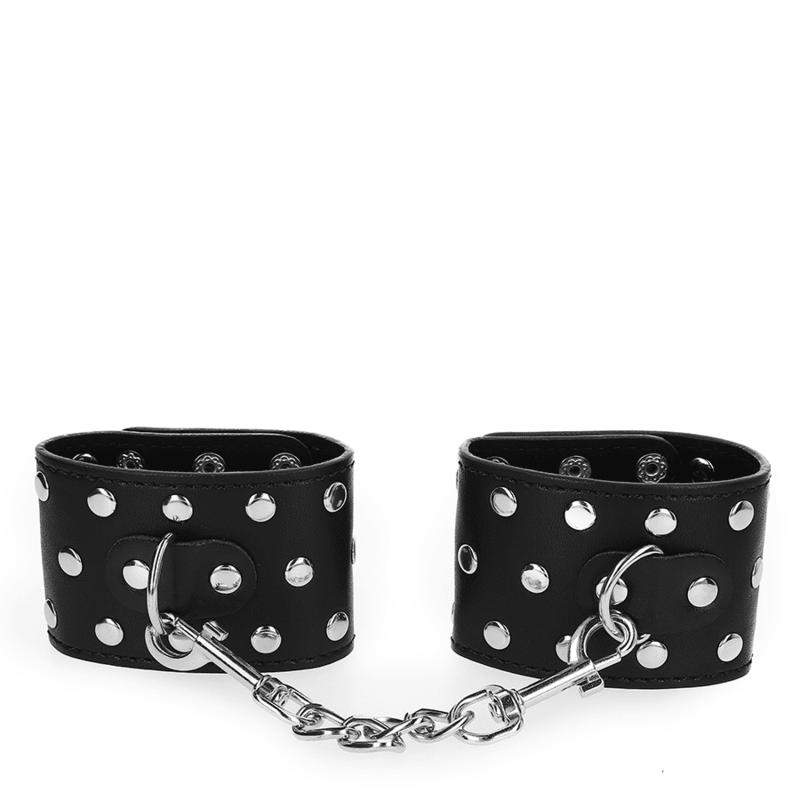 KINK - WRIST RESTRAINTS WITH SNAP FASTEN FULL OF RIVETS BLACK ADJUSTABLE 19 - 24 CM X 5.5 CM - Kink&Play